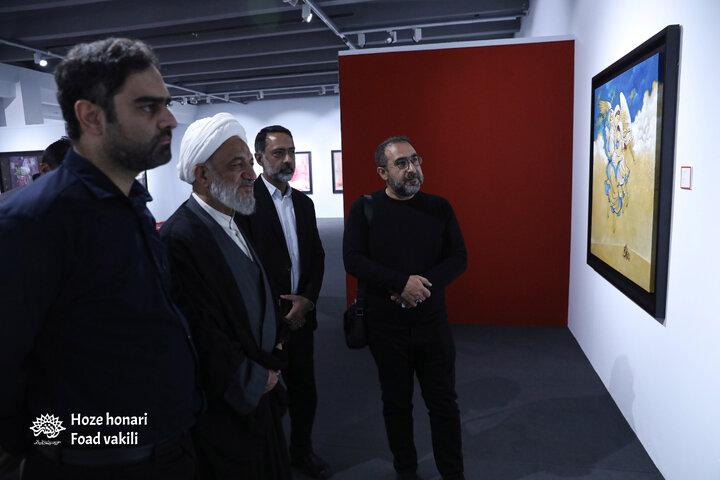 حجت‌الاسلام مرتضی آقا تهرانی و امیرحسین ثابتی در نمایشگاه «مدرسه میناب»